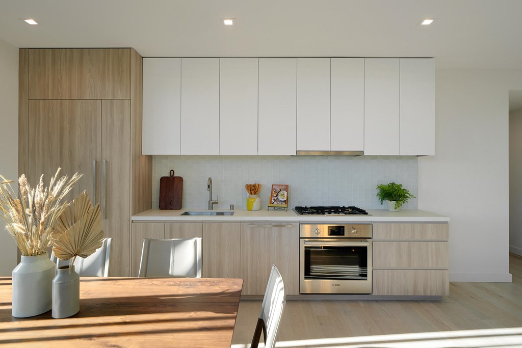 residential kitchen with full size premium appliances and dine-in kitchen