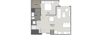 A floor plan of a small apartment with a bedroom, kitchen, and bathroom.