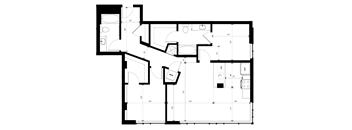 A floor plan of a house with a kitchen, living room, and two bedrooms.