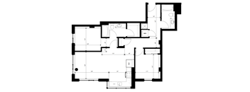 A floor plan of a house with a kitchen, living room, and two bedrooms.