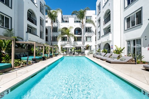 Pool deck and cabanas at Reveal Playa Vista in Playa Vista, CA.