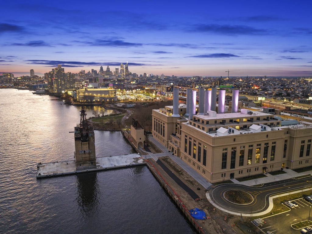 an aerial view of the city at dusk