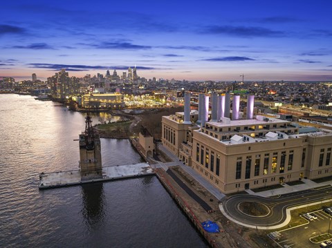 an aerial view of the city at dusk