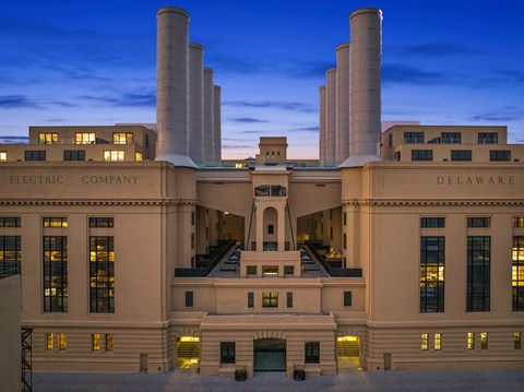the facade of the delaware insurance company building at night