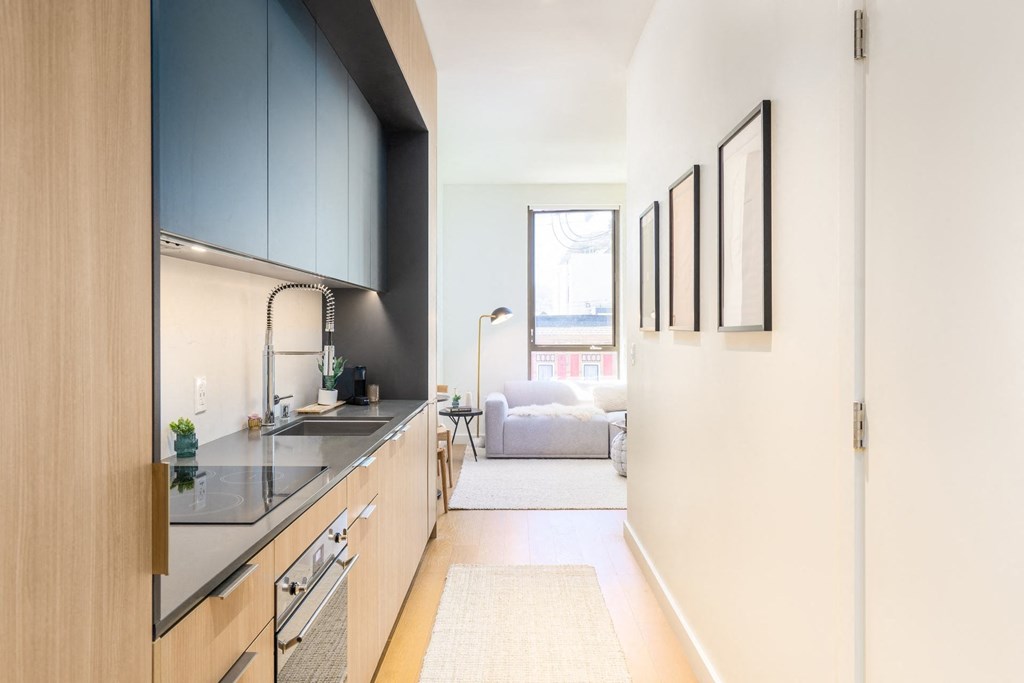 apartment entryway and kitchen