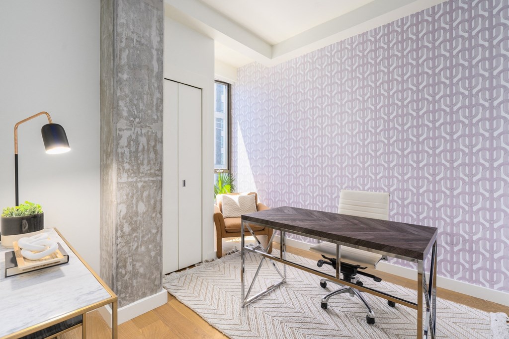 office set up in a two-bedroom apartment