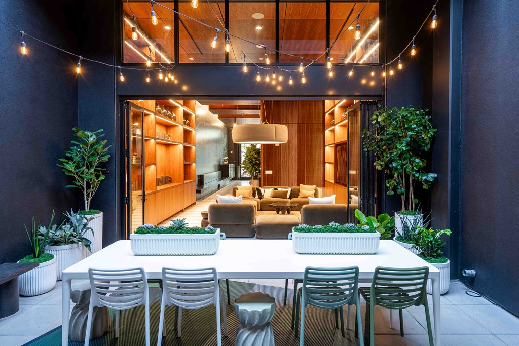 a dining room with a table and chairs