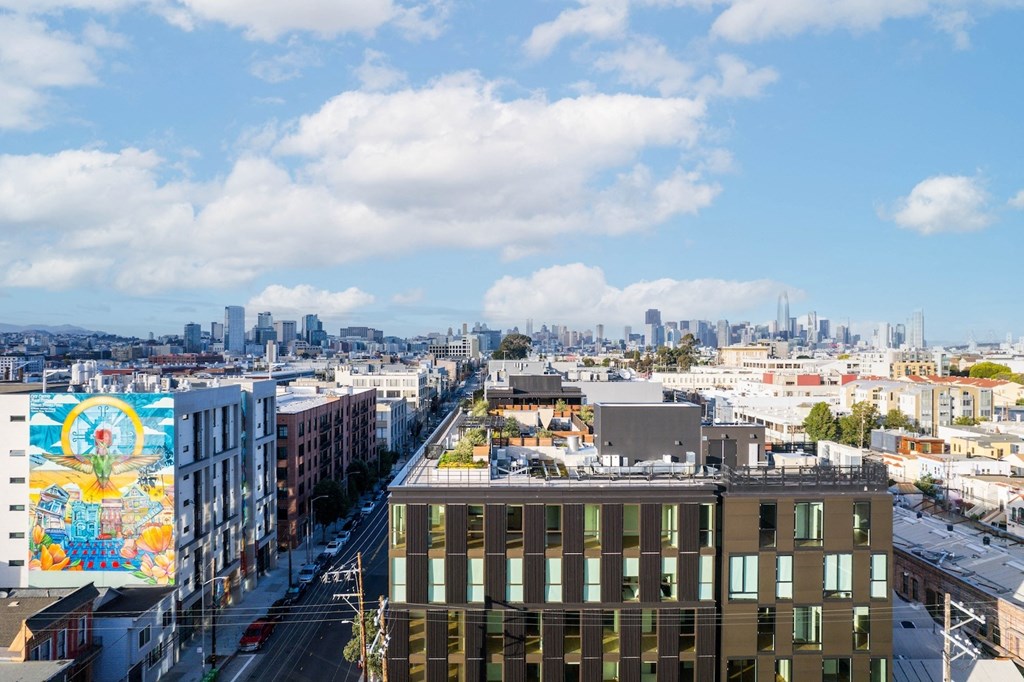 a view of the city from the roof of a building