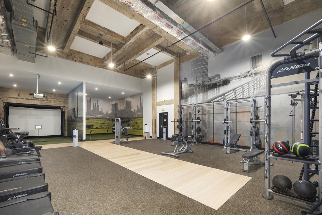 the gym is equipped with weights and cardio equipment