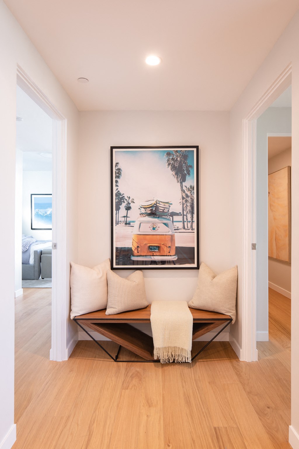 a seating area with a couch and pillows in a 555 waverly unit