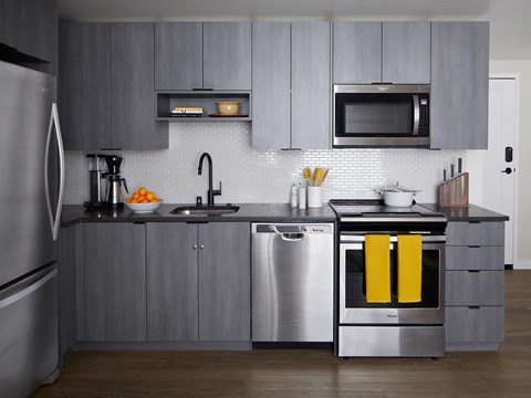 Fully-Equipped Kitchens with Stainless Steel Appliance Sentral First Hill Fully-Equipped Kitchens with Stainless Steel Appliance