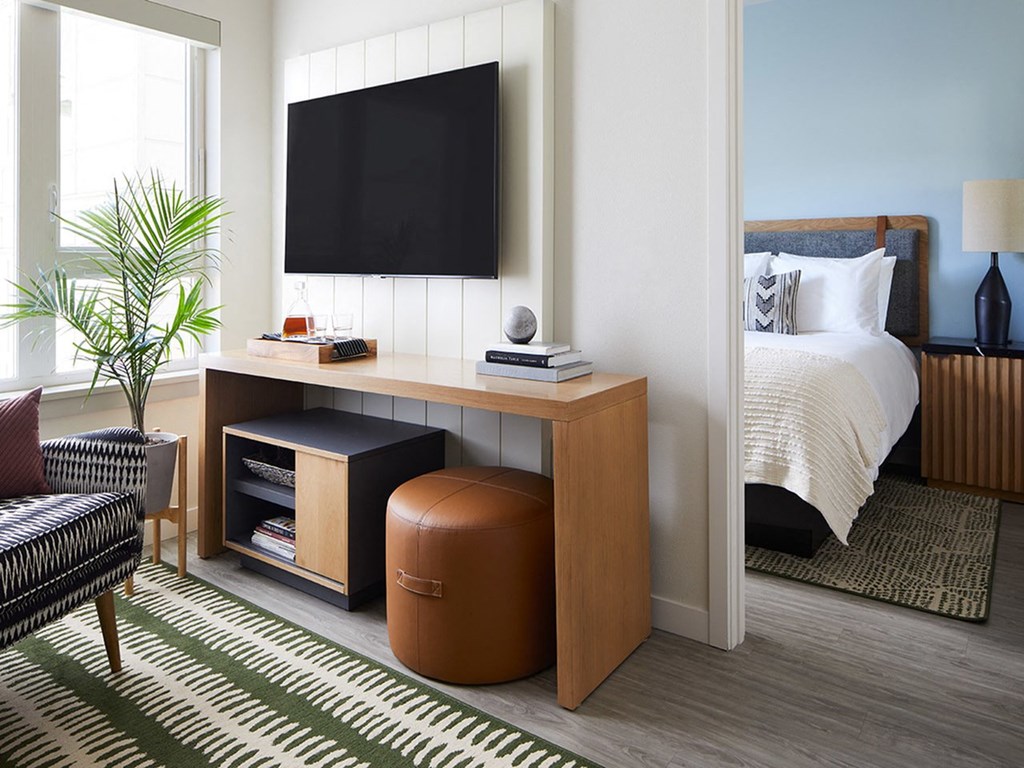 Sentral SLU Designer-Furnished Apartment Suites Include a 55” Flatscreen Smart TV with Complimentary WiFi