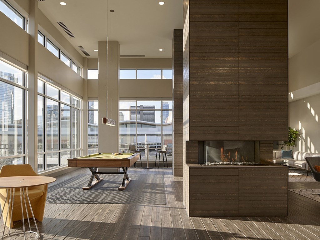 Sentral SoBro Clubroom Lounge with Direct Pool Access, Lounge Seating, Game Room, and Bar