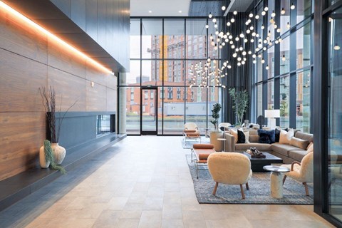 Styled Lobby Patios & Waterfront Seating | The Sutton, Portland OR