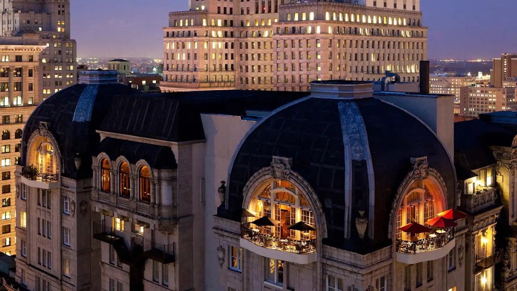 a view of the top of a building at night