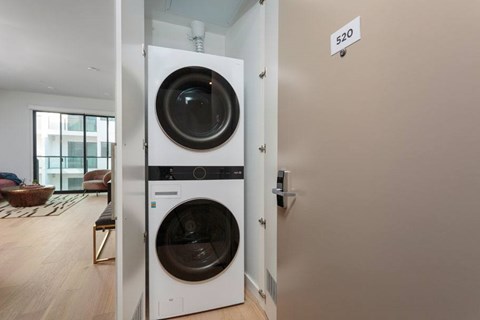 A modern laundry washer dryer at Ten310