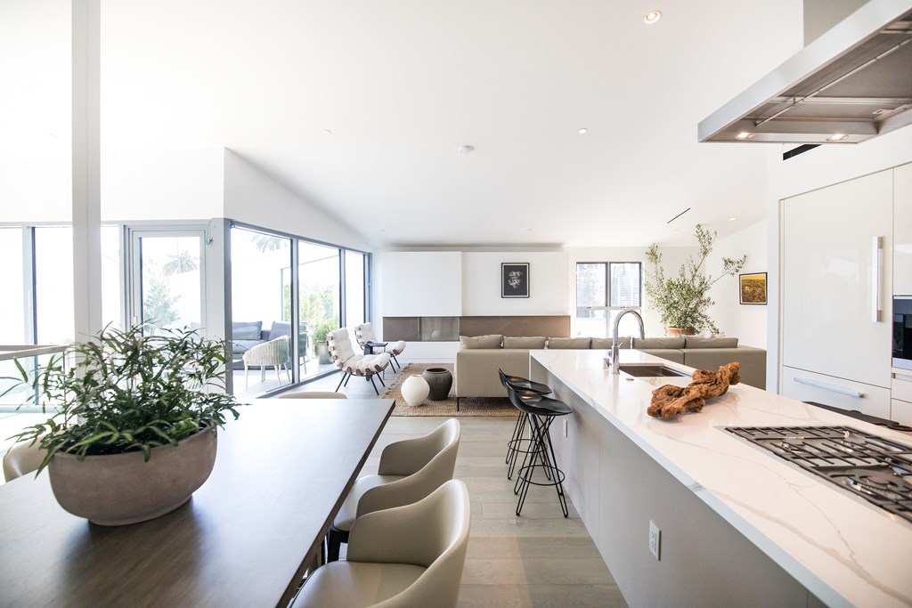 a view of the kitchen and living room from the dining area