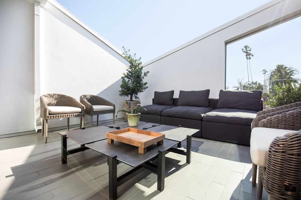 private balcony with furniture and natural light