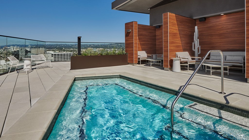 rooftop pool and spa with city views Sentral Beverly Hills apartments