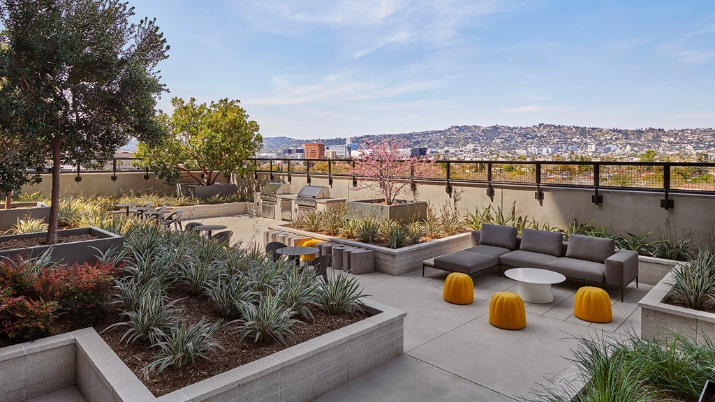 rooftop patio with a view of the city Sentral Beverly Hills apartments