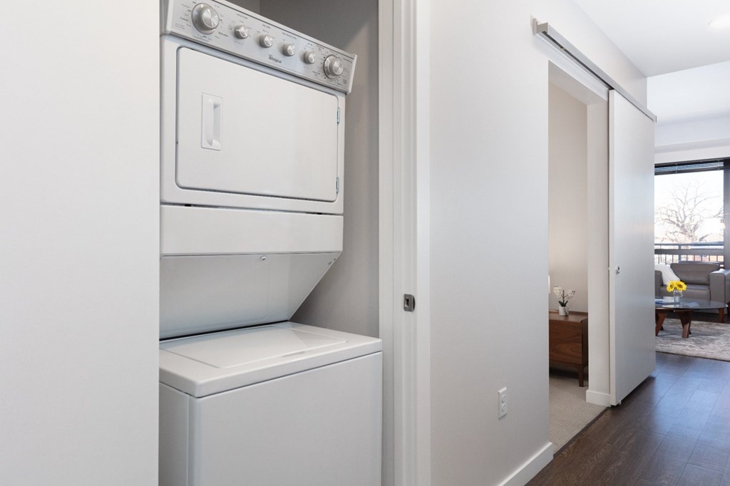 A white oven and dishwasher in a modern kitchen.