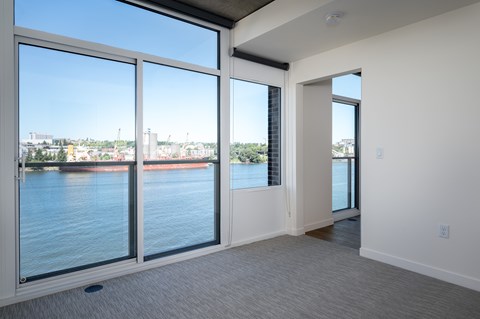 High Ceilings & Oversized Windows with Roller Shades | The Sutton, Portland OR