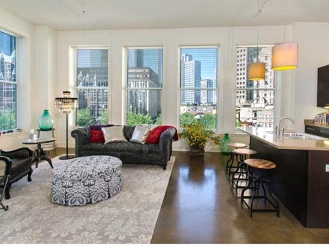 a living room with a couch and a table