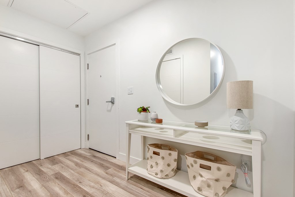 a bathroom with a vanity and a mirror