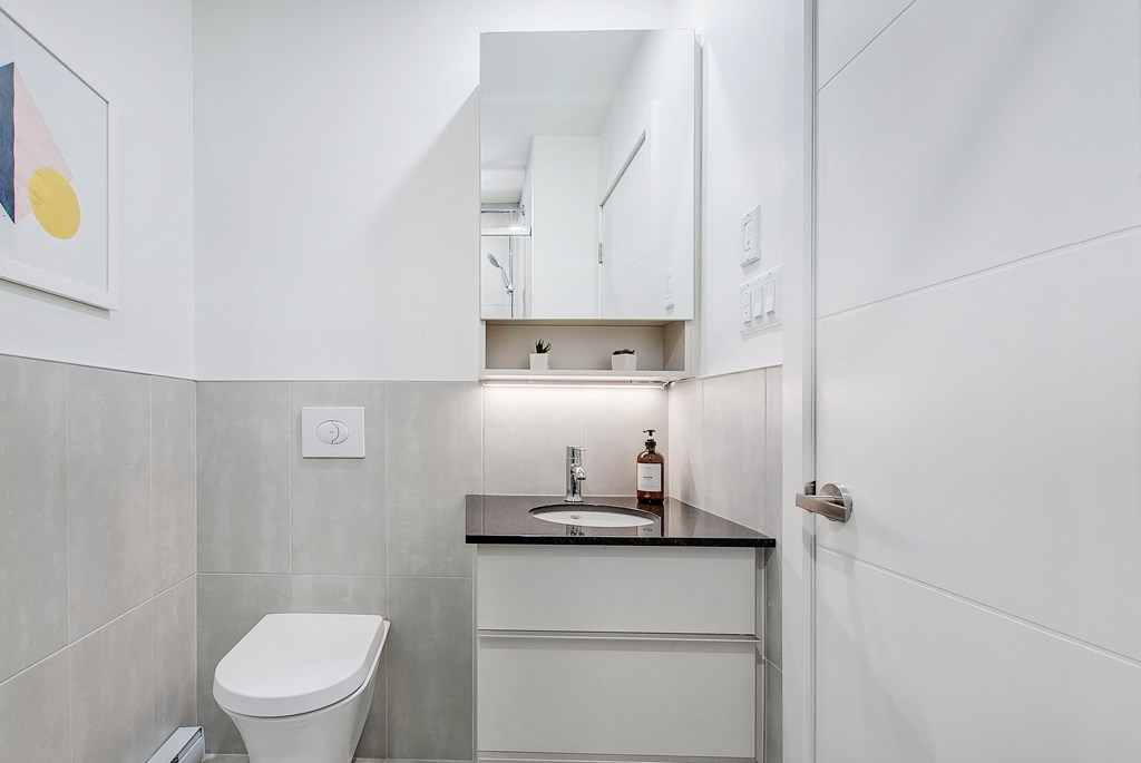 a small bathroom with a toilet and a sink