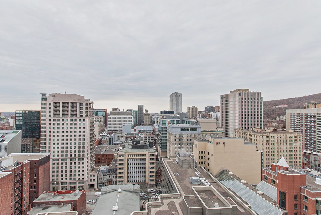 a view of the city from the roof of a building