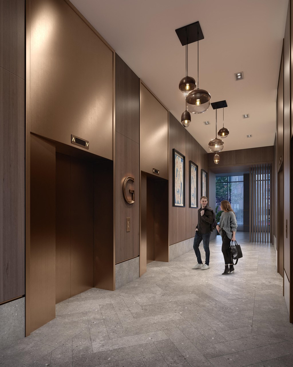 two people walking down a hallway with bronze elevator doors