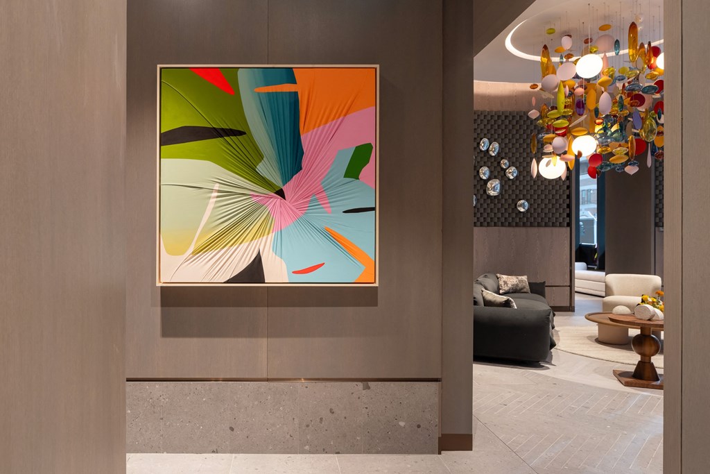 the frame hanging on the wall in a living room