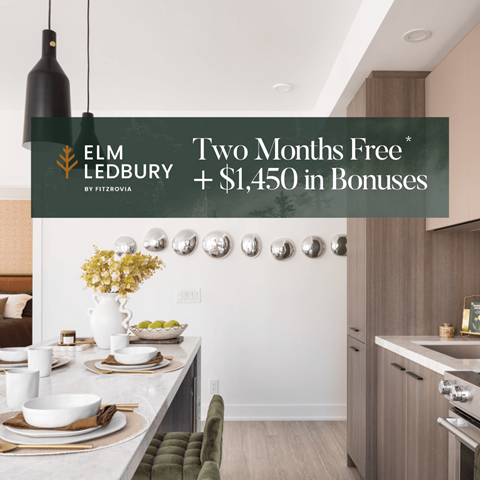 a kitchen with a table and a sign that reads two months free  450