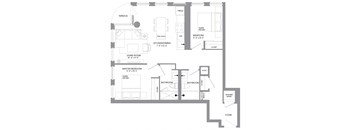a floor plan of a house with a lot of furniture and a staircase