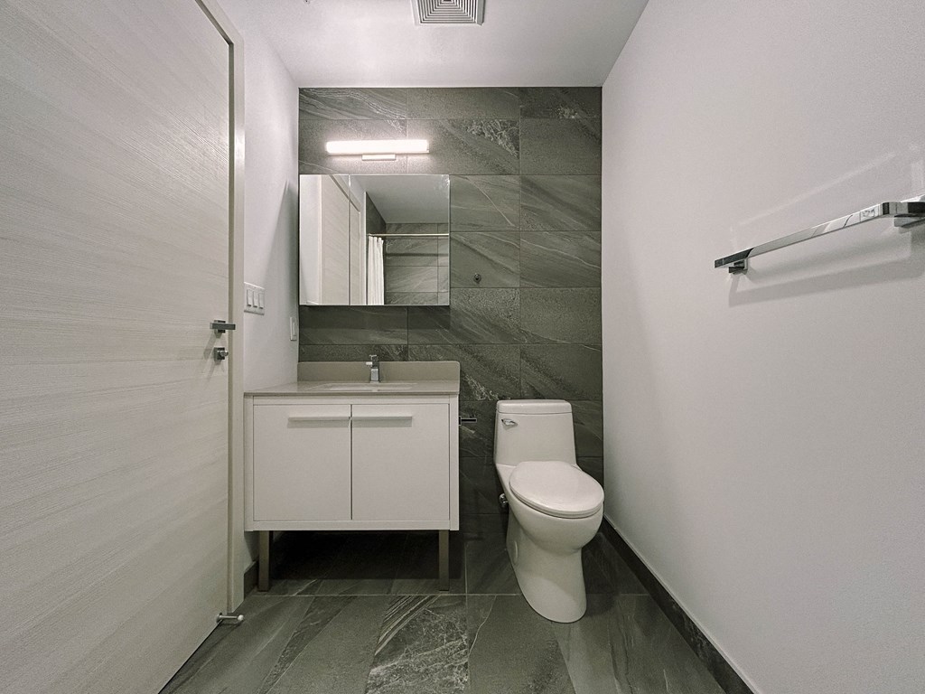 a small bathroom with a toilet and a sink
