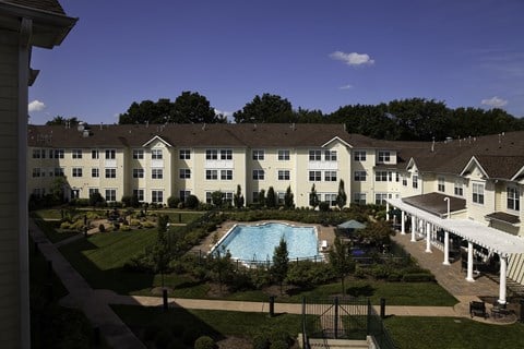 Garden Courtyard and Pool View at The Kentshire Senior Apartments in Midland NJ