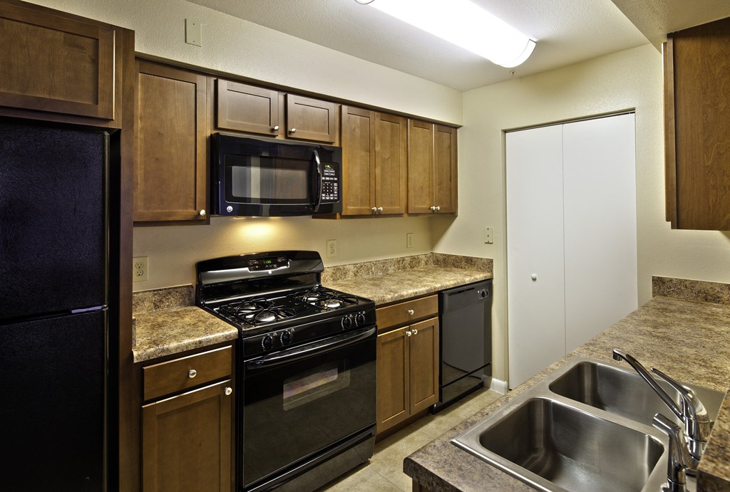 Apartment Kitchen at Timberleaf Affordable Apartments in Orlando, Florida