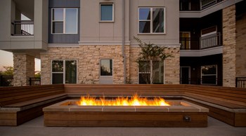 Outdoor Fireside Lounge at Parc at White Rock Luxury Apartments in Dallas TX - Photo Gallery 14