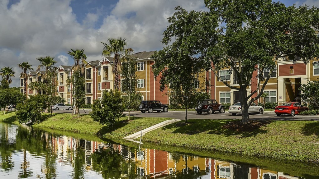 Nicely maintained landscaping with water views at The Amalfi Clearwater Apartments