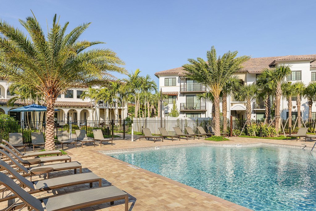 Pool with plenty of seating at Azura in Kendall, FL