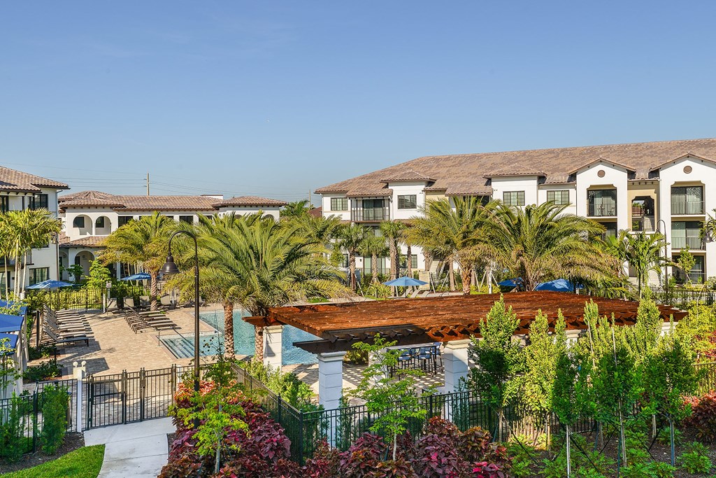 Lush landscaping and well maintained exterior homes at Azura in Kendall, FL