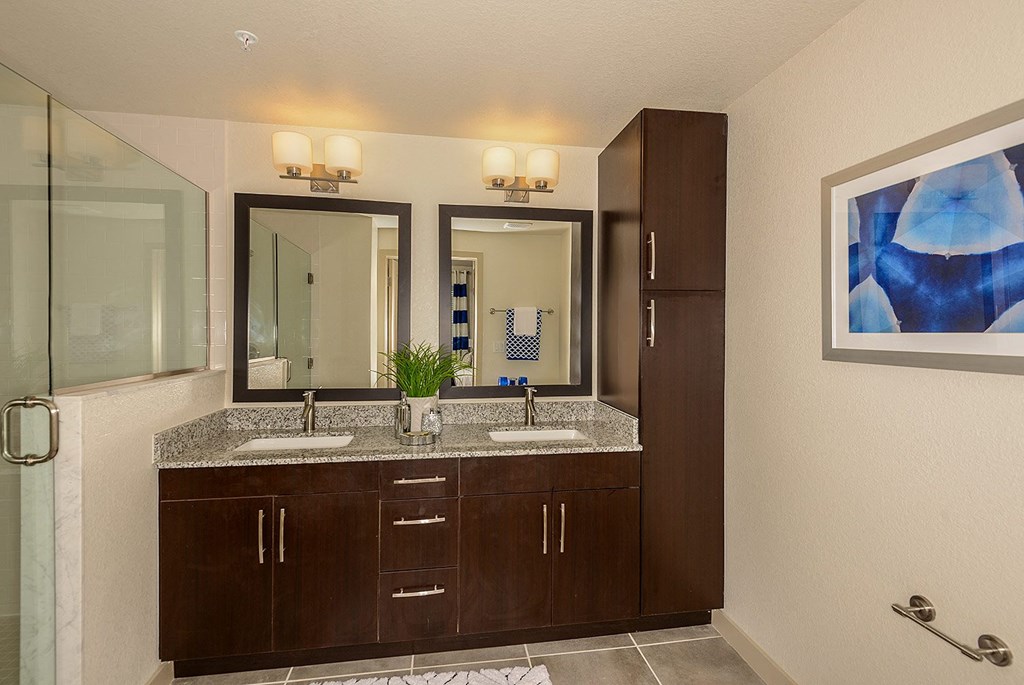 Bathroom with double sinks in select homes at Azura in Kendall, FL