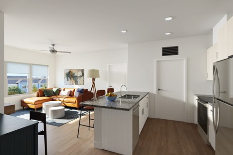 A modern kitchen with a refrigerator, sink, and stove.
