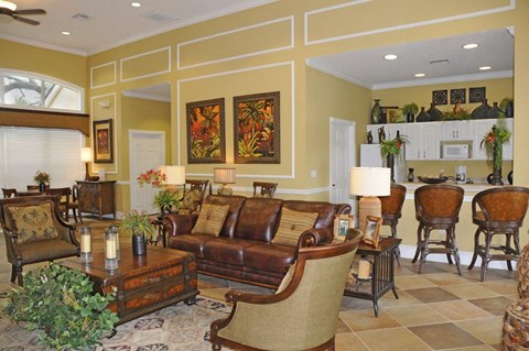 a living room with a couch and a table