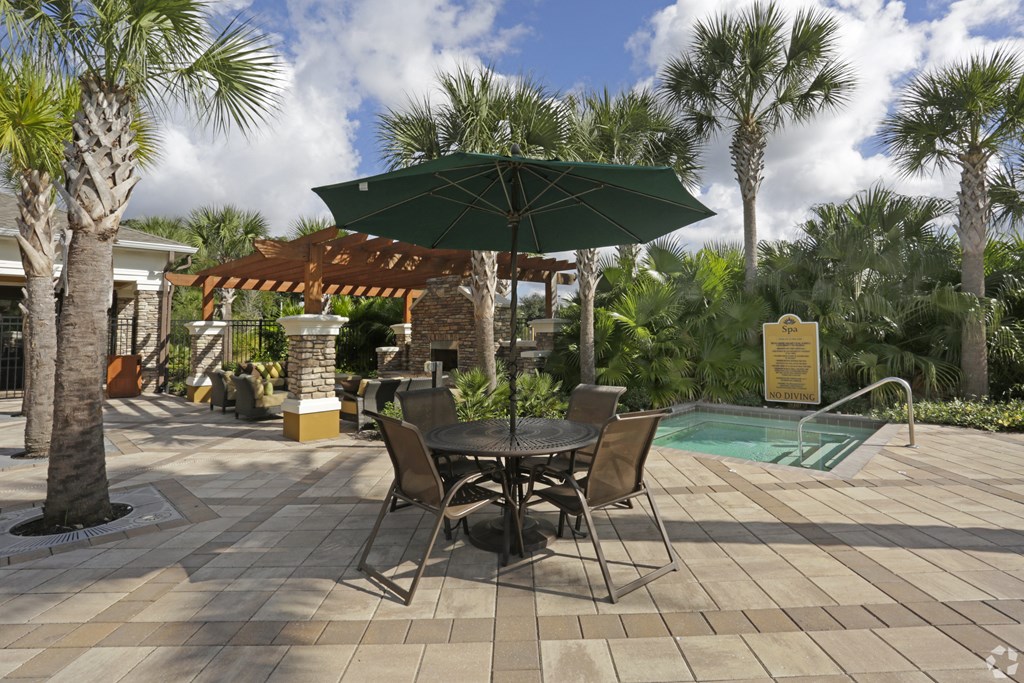 Poolside Seating at Bennett Creek Apartments in Jacksonville, FL
