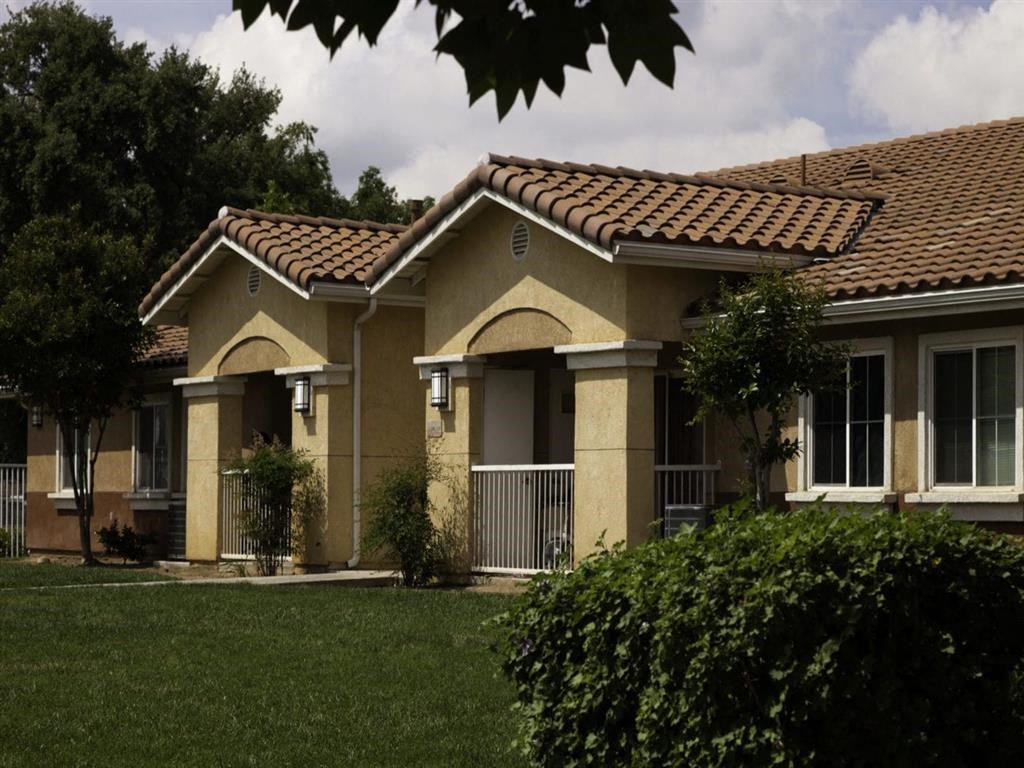 a house with a lawn in front of it