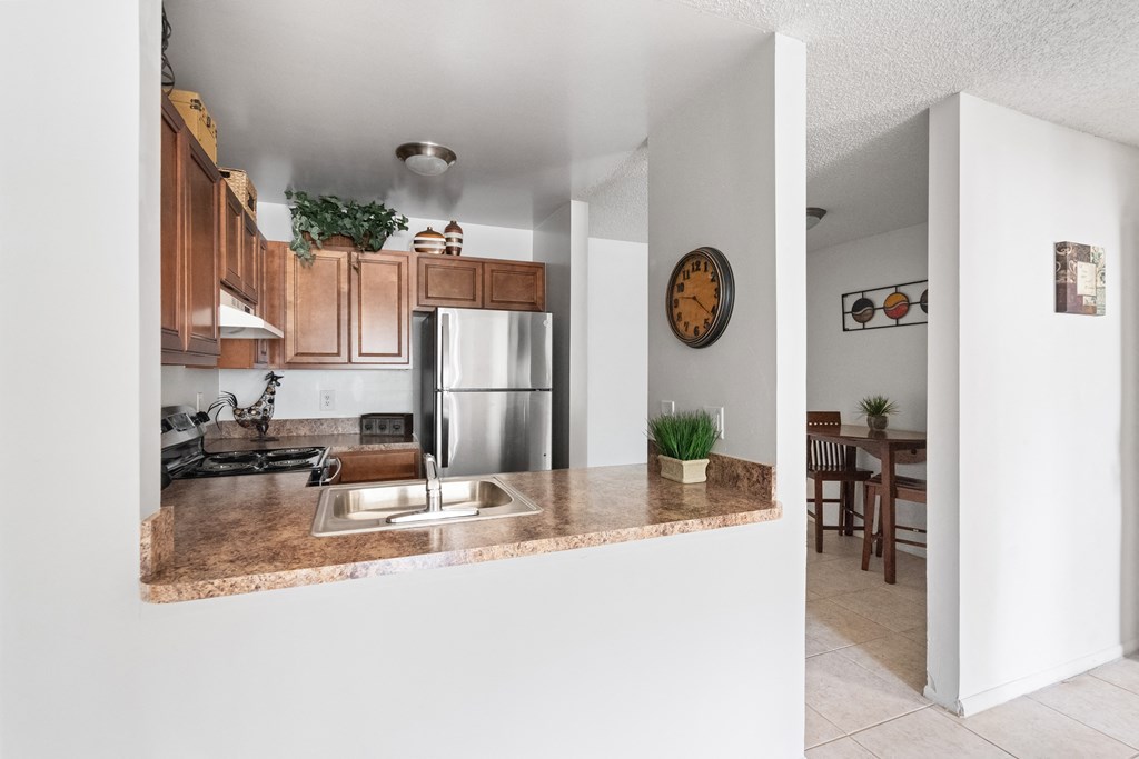 Kitchen with dining areas at  Rivercrest Apartments in Melbourne FL