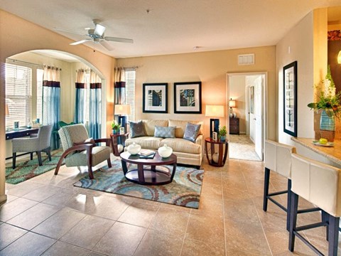 a living room with a couch and a table