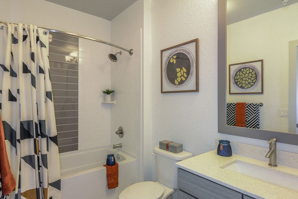 a bathroom with a shower and a sink and a toilet  at Grady Square, Tampa, Florida