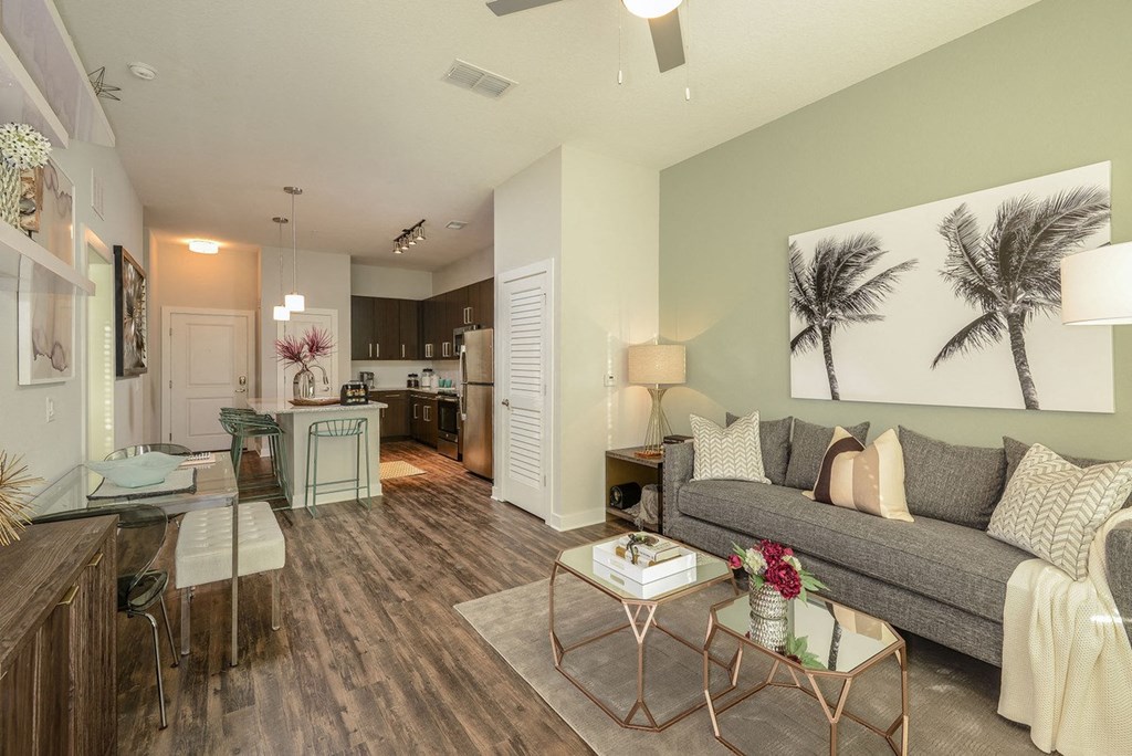 a living room with a couch and a table  at Grady Square, Tampa, 33607